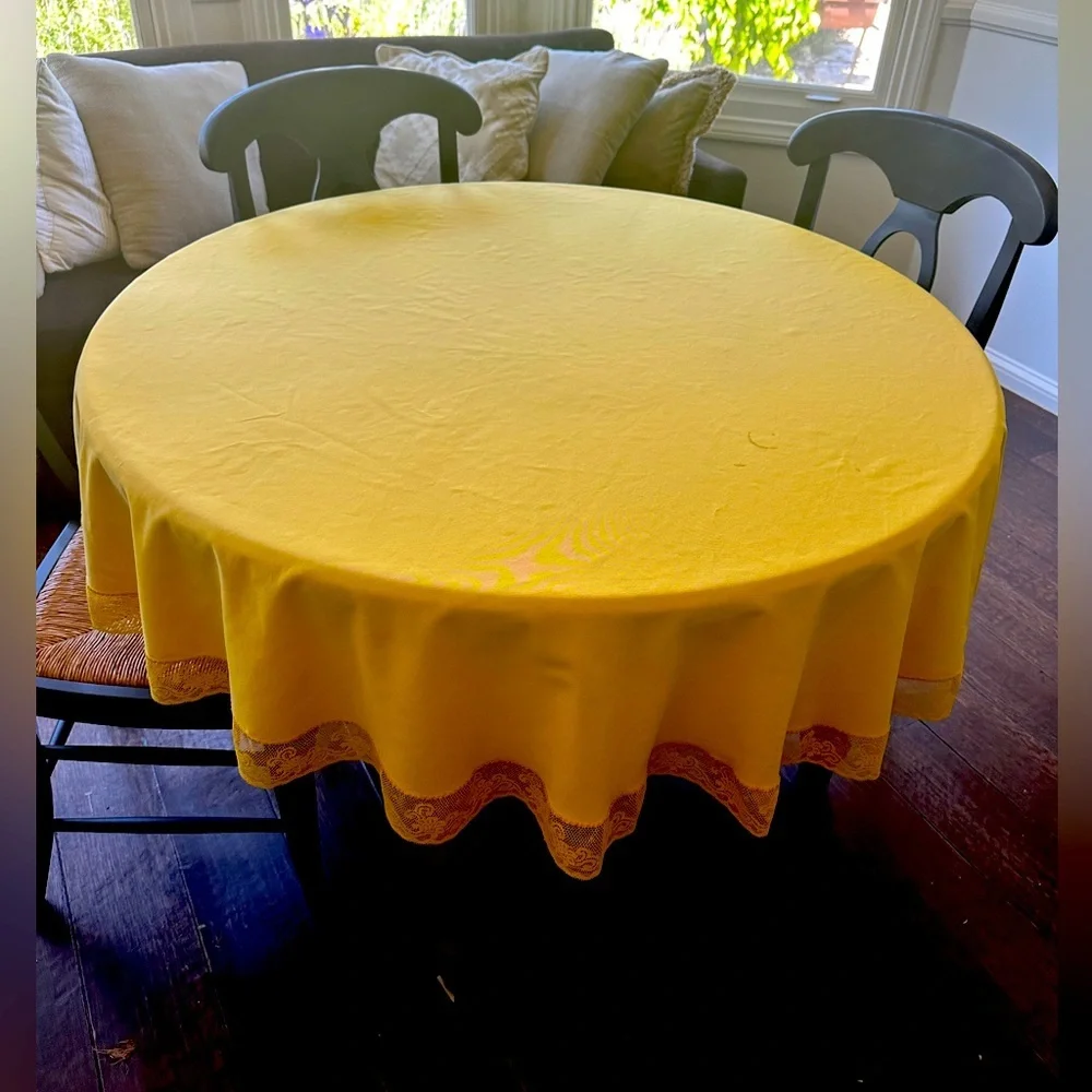 Vintage round yellow tablecloth with lace trim